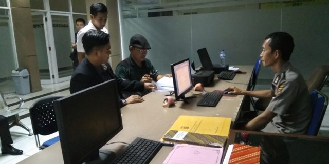 Aruji saat membuat laporan ke polisi.